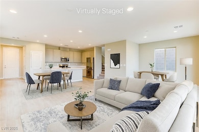 Living room featuring recessed lighting and light