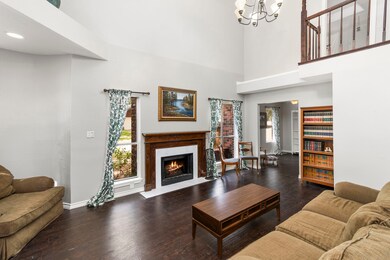 The living room has plenty of room for movie or ga