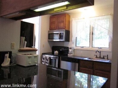 open kitchen counter looking to living room