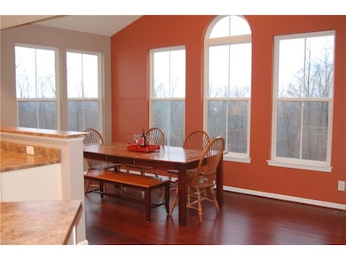 Great room w/new hard wood floors and vaulted ceil