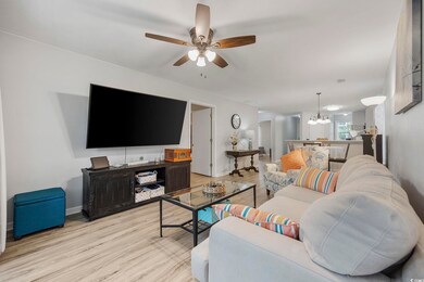Living room featuring light hardwood / wood-style 