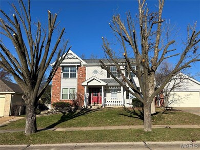 16128 Barrier Reef Ct, Grover, MO 63040 - photo 2