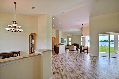 Spectacular view of interior and lake when you ent
