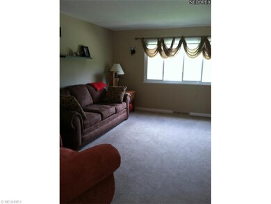 Living Room with newer carpeting and woodwork. Lar