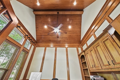 The soaring ceiling, beautifully accented with cus