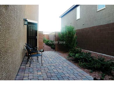 Property Photo. Landscaped courtyard entry. Securi