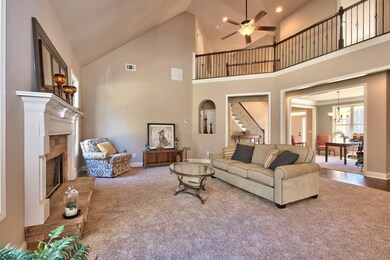 contemporary open layout, stone accented  fireplac
