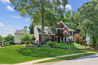 View of front of house featuring a front lawn