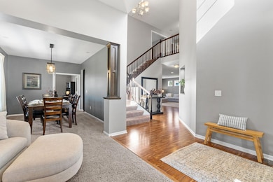 Vaulted ceilings and a graceful sitting area create an immediate sense of openness.
