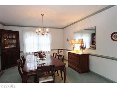 Dining Room - Formal dining room; carpeted over ha