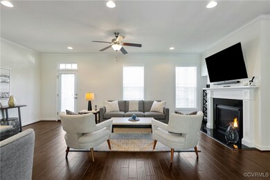 Living room featuring dark hardwood / wood-style f