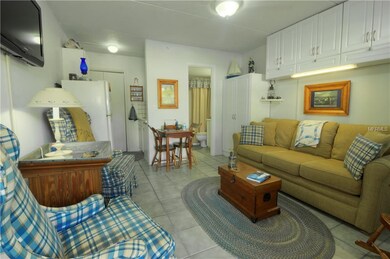 Cozy studio with ceramic tiles throughout.