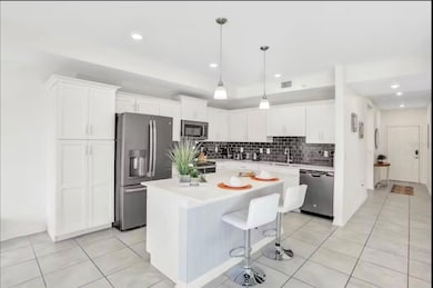 4751 Clock Tower Dr unit 203, Kissimmee, FL 34746 - photo 2