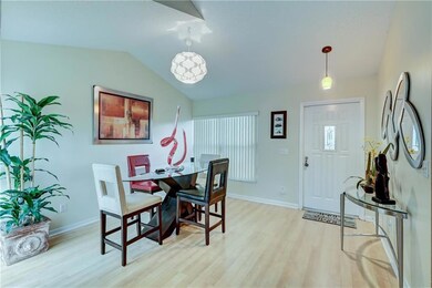 Dining room with vaulted ceilings
