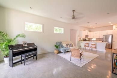 Living room featuring recessed lighting, finished