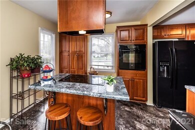Enlarged kitchen with additional cabinets, built i