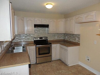 Kitchen. Updated kitchen with new tile backsplash.