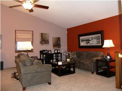 The living features incredibly PLUSH carpet and a 