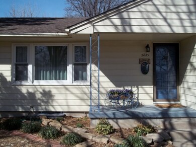 The front door has a full view storm door.