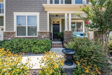 Professionally landscaped yard and rocking chair f