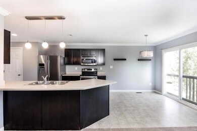 Eat in Kitchen, Modern Lighting and Floating shelves with sliding door.