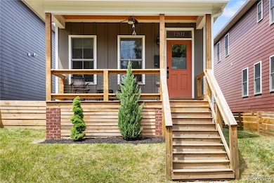 A rustic wooden staircase with clean cable railing