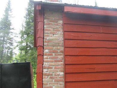 Other. Brick chimney. Black storage...