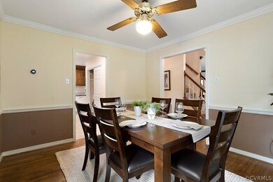 Large Dining Room with a gleaming hardwood floor.