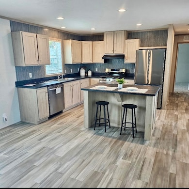 Looking into open kitchen with island