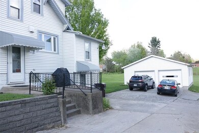 Two car detached garage - side grilling porch off 
