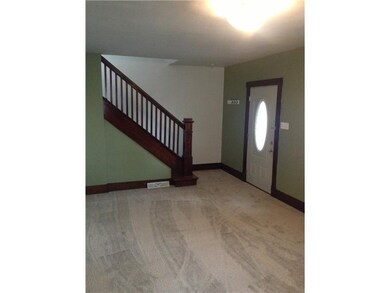 Living Room. This living room measures approximate