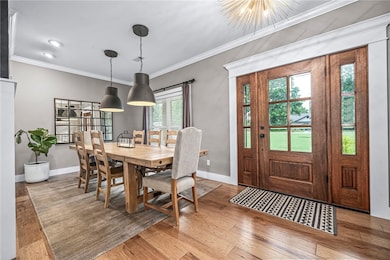 Welcoming entryway with a rich, updated wood front