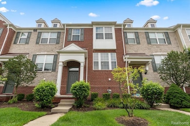 Traditional-style home with brick siding