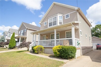 View of front of house featuring a porch and a front yard