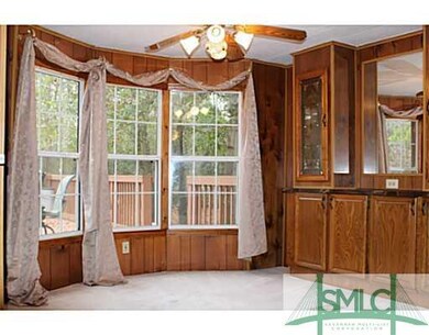 Breakfast Area. Bay windows with built in cabinetr