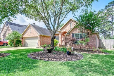 This all brick home has been immaculately cared for.  This picture was taken before the flowers were in full bloom.  Notice the double wide driveway and sidewalk to the covered front door.  New outdoor lights keep the pathways well lit and the sprinkler system keeps the grass and flowers well watered.
