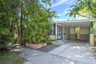 carport and entrance to back yard