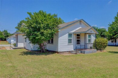 Front view of Home, slight view of detached garage