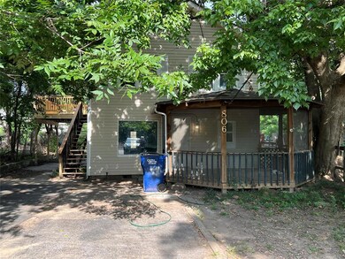 Rear view of house featuring a deck