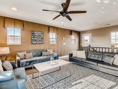 Third floor living room with outdoor deck access.