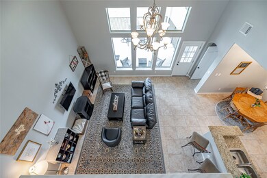 The upgraded tile flooring pulls in the natural light to let this space glow! Open & spacious there is a great sense of comfort here. Perfect for the family to stay close together!