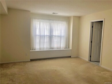 Master bedroom with entrance to bath