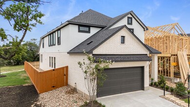View of home's exterior featuring a shingled roof