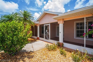 View of exterior entry with stucco siding