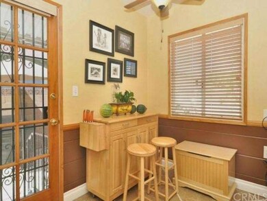 Breakfast nook with ceiling fan.