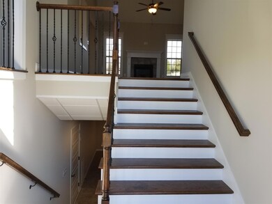 Classic clean lines to be enjoyed in this oak tread laden stairwell up to the main level!