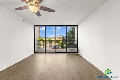 Living Area facing lanai *Enhanced Photo