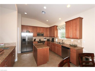 12811 Carrington Cir unit 1-201, Naples, FL 34105 - photo 2