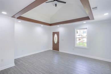 Inside rich luxury vinyl plank flooring flows thro