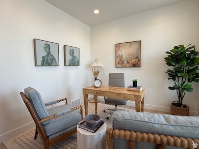 Office space featuring recessed lighting, visible vents, and baseboards